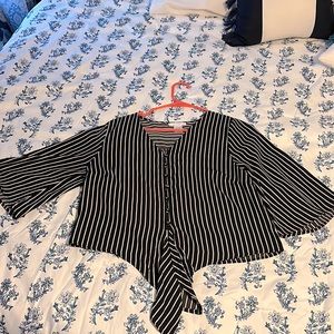 Dressy blouse. Black and white stripes have been worn only one time.